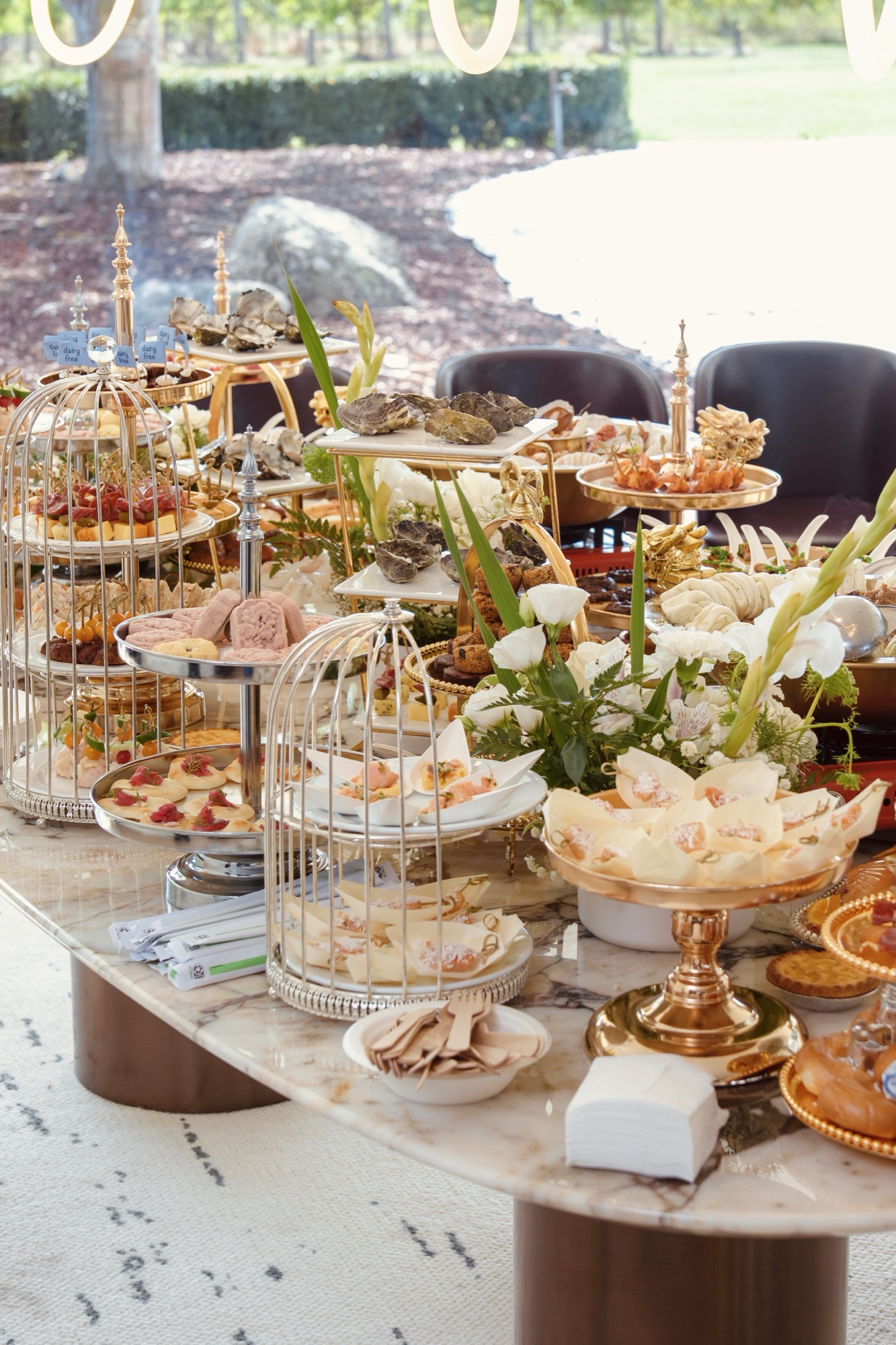 Elegant grazing and high tea catering table styling
