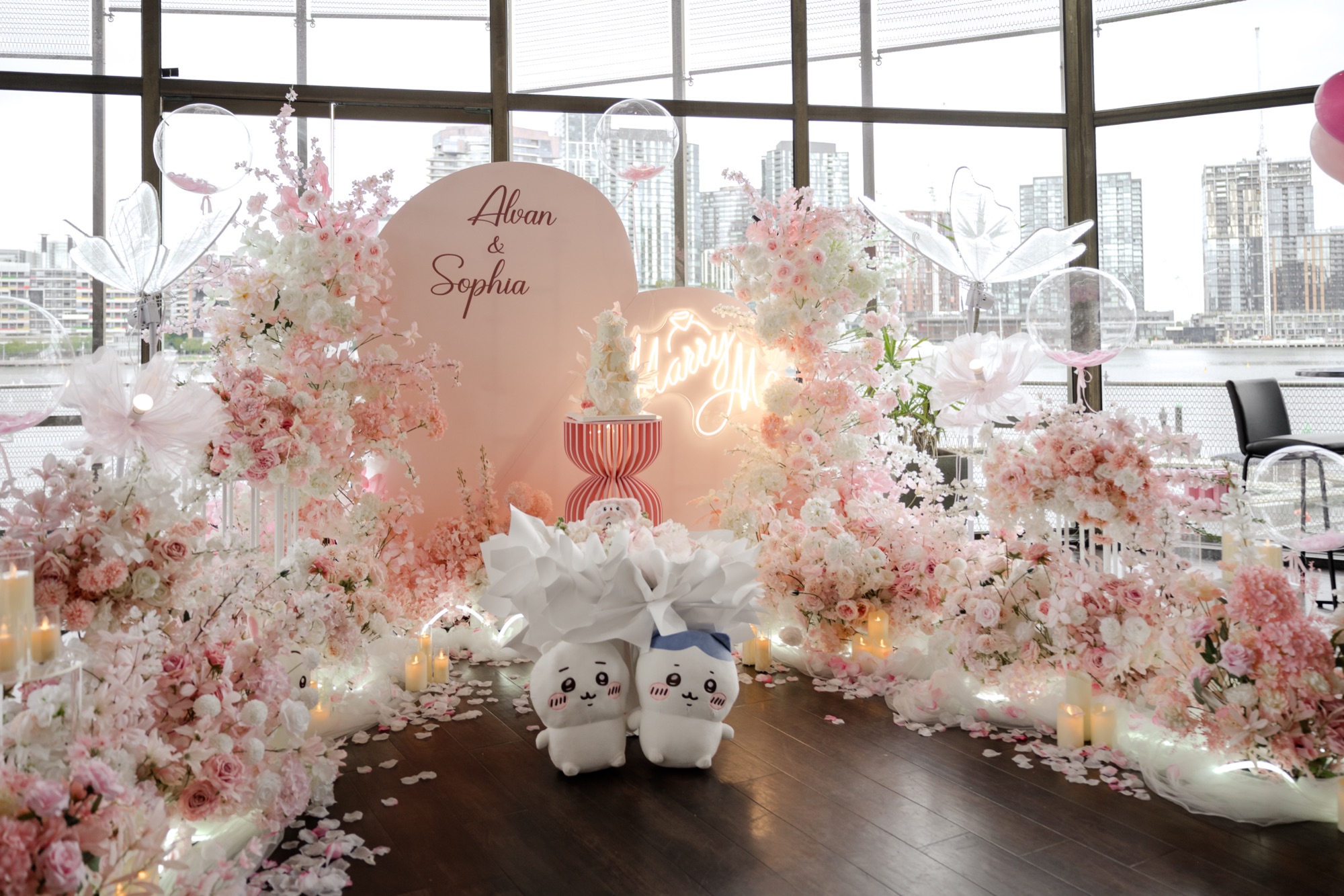 Floral sweetheart table backdrop for a wedding reception