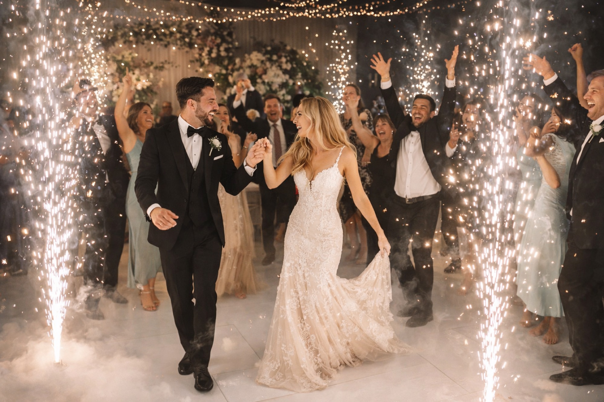 Bride and groom dancing through a sparkler send-off